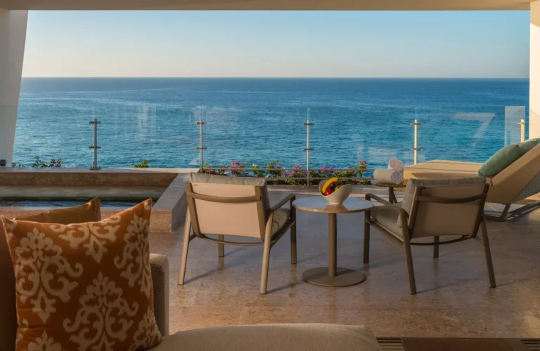 Grand Class Suite bedroom with king bed at Grand Velas Los Cabos