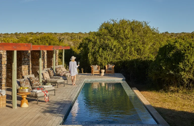 The lap pool and sun deck at the main area of Kwandwe Ecca Lodge